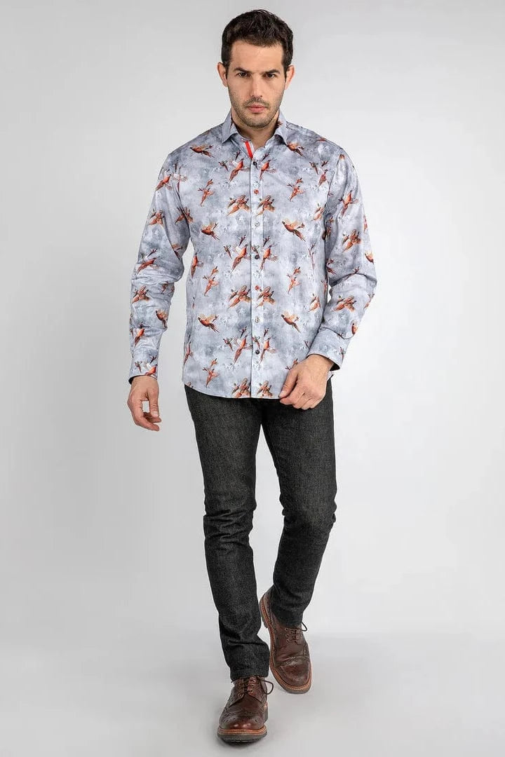 A man wearing a Claudio Lugli shirt with a pheasants flying print.