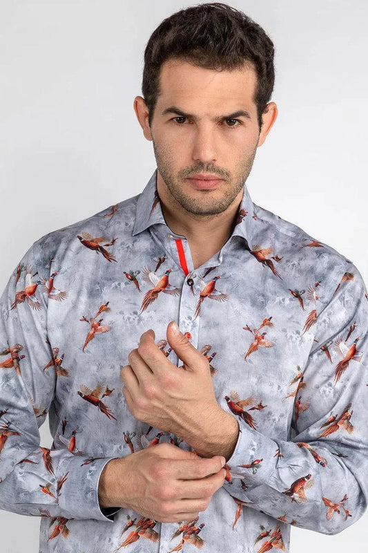 A man wearing a Claudio Lugli shirt with a pheasants flying print against a grey background