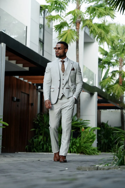 A man wearing Paul Andrew Mark Stone Check Three Piece Suit, Summer Wedding