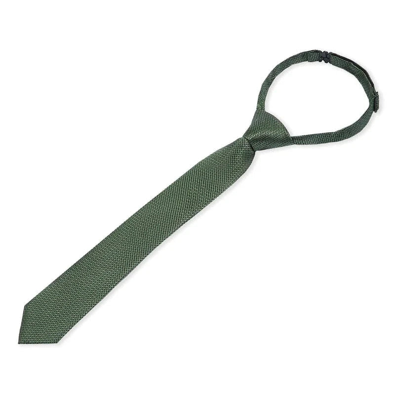 Boys Paul Andrew green textured tie on a white background