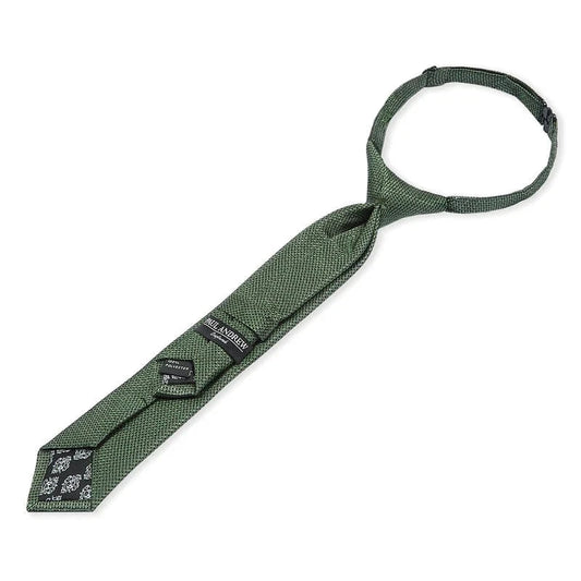 Boys Paul Andrew green textured tie on a white background