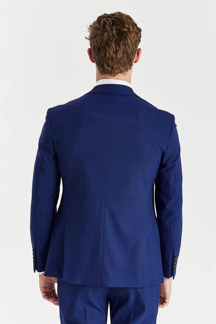 Man wearing a blue suit jacket on a white background