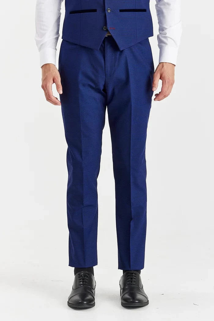 Blue suit with a white shirt and black shoes on a white background