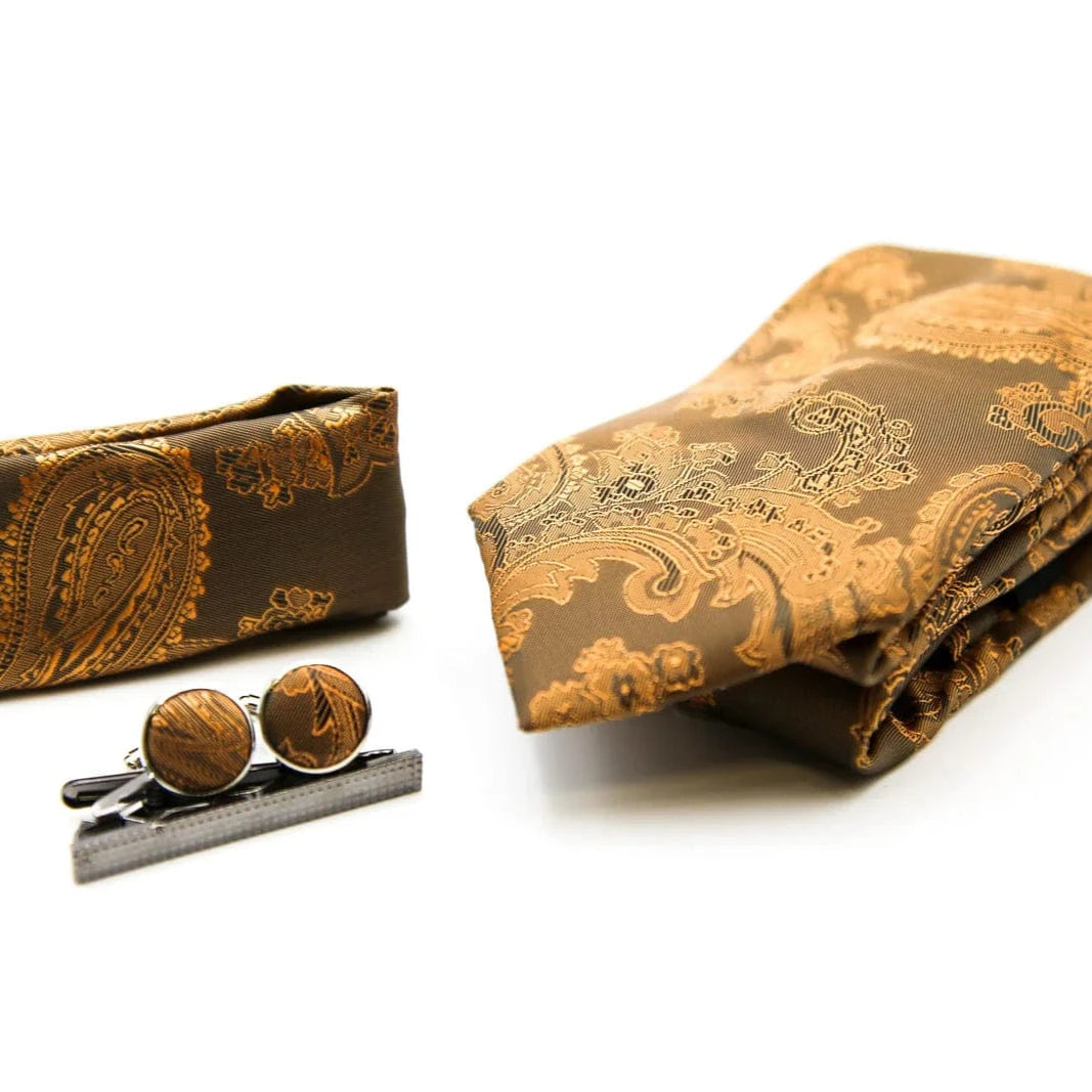 Paul Andrew brown paisley patterned tie, tie clip, and cufflinks on a white background