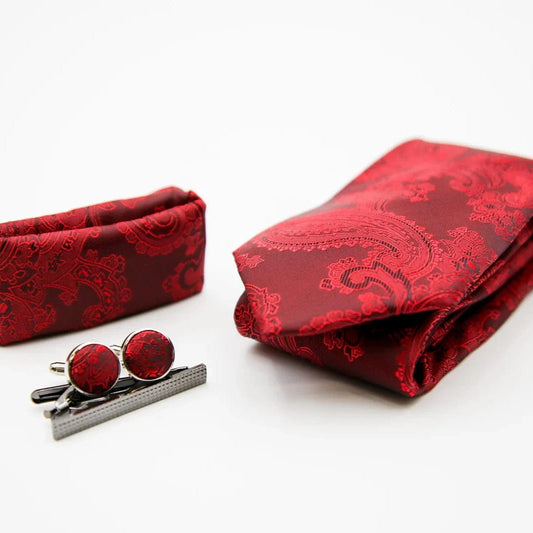 Paul Andrew red paisley tie, cufflinks, and pocket square on a white background