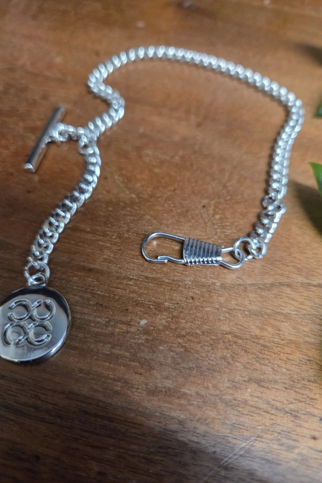House Of Cavani T-bar waistcoat chain, showing a close up of the clip design for weddings and the races