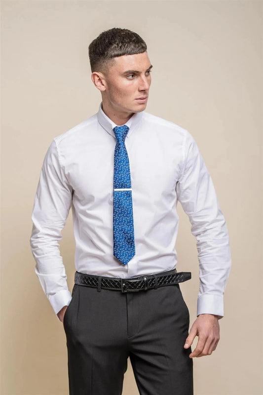 A man wearing a white long sleeve slim fit dress shirt with a pin collar, paired with a blue tie and black trousers.