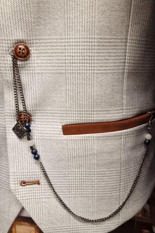 Paul Andrew Antique Waistcoat Chain attached to a men’s waistcoat from Menz Suits Stockport, adding a classic finishing touch to formalwear.