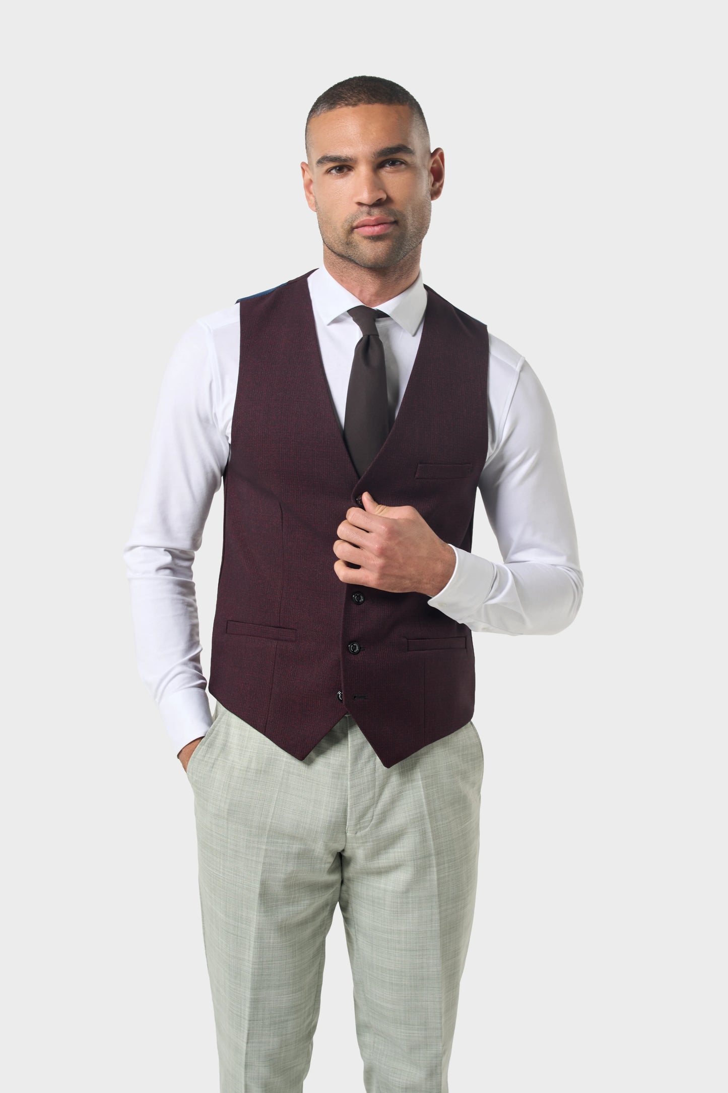 Cavani Camden Sage wedding suit with contrasting Caridi Wine waistcoat