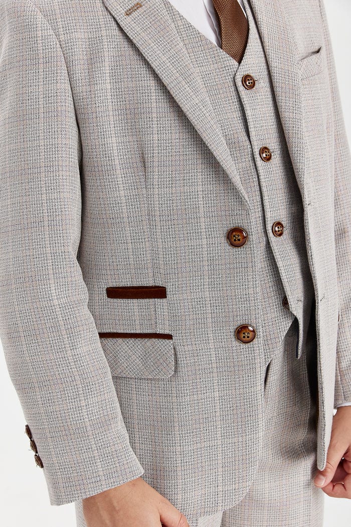 Beige checkered suit jacket with brown buttons on a white background
