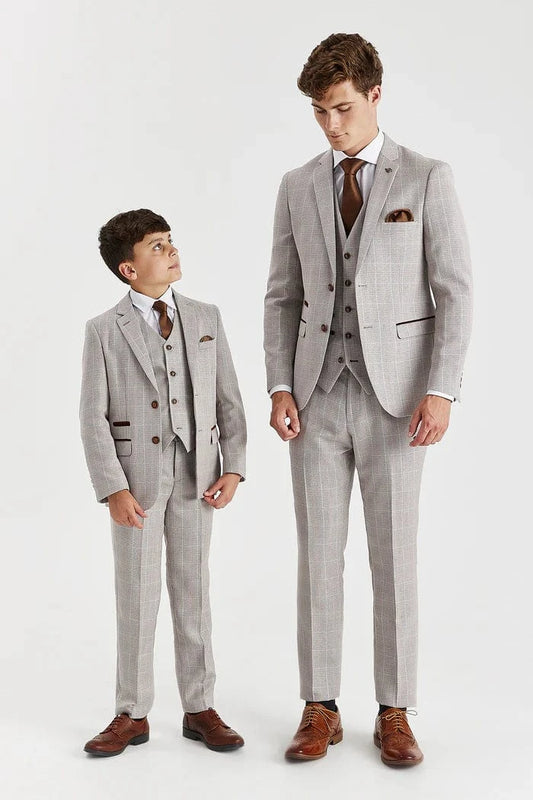 Father and son wearing matching Paul Andrew Leo Beige Tweed Three Piece Suits from Menz Suits Stockport, showcasing coordinated wedding and formalwear style.