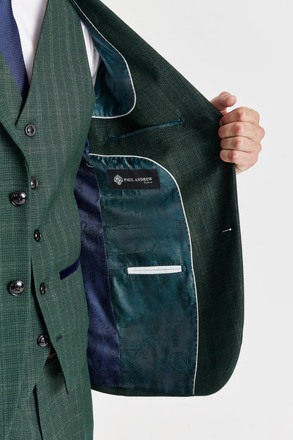 Green suit jacket with a visible brand label on a white background