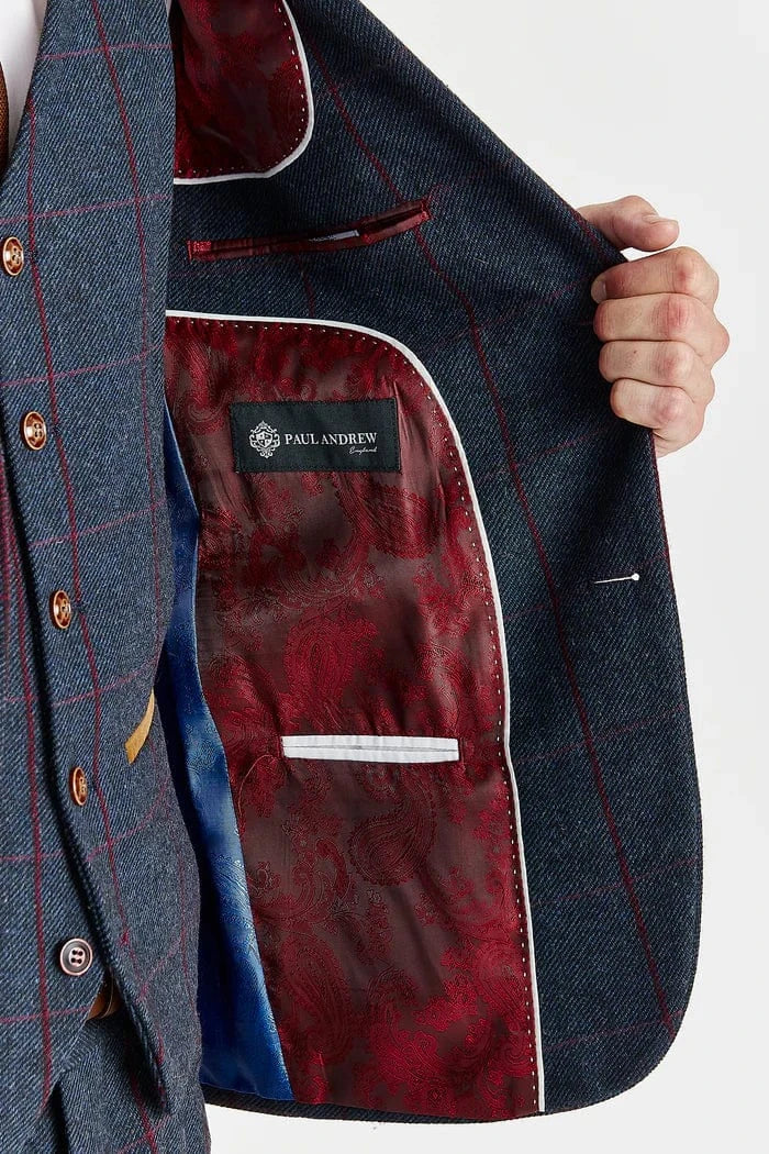 Close-up of a suit jacket with a visible brand label on a white background