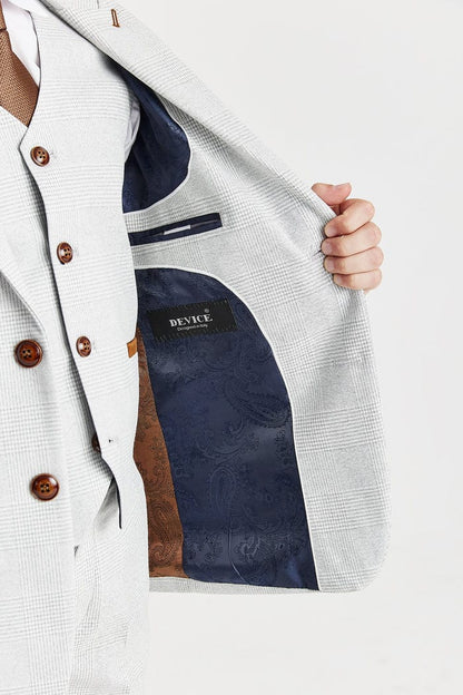 Close-up of a jacket with a visible brand label on a white background