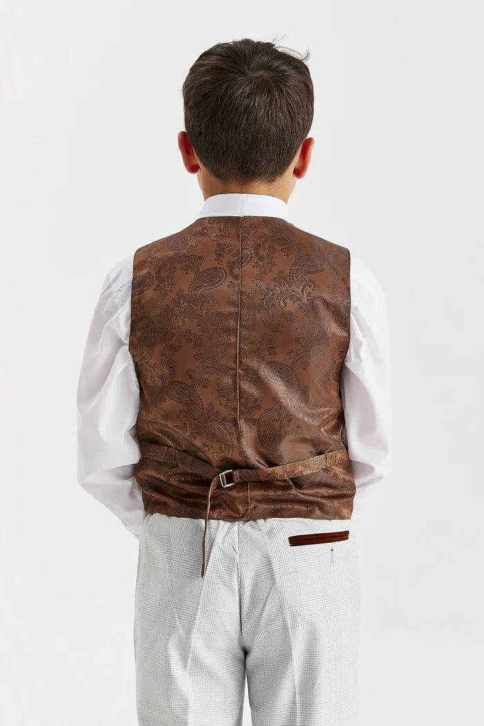 Child wearing a brown leather vest on a white background