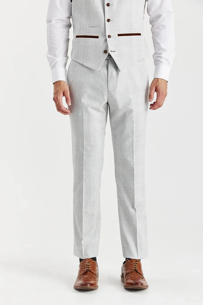Stone suit with brown shoes on a white background