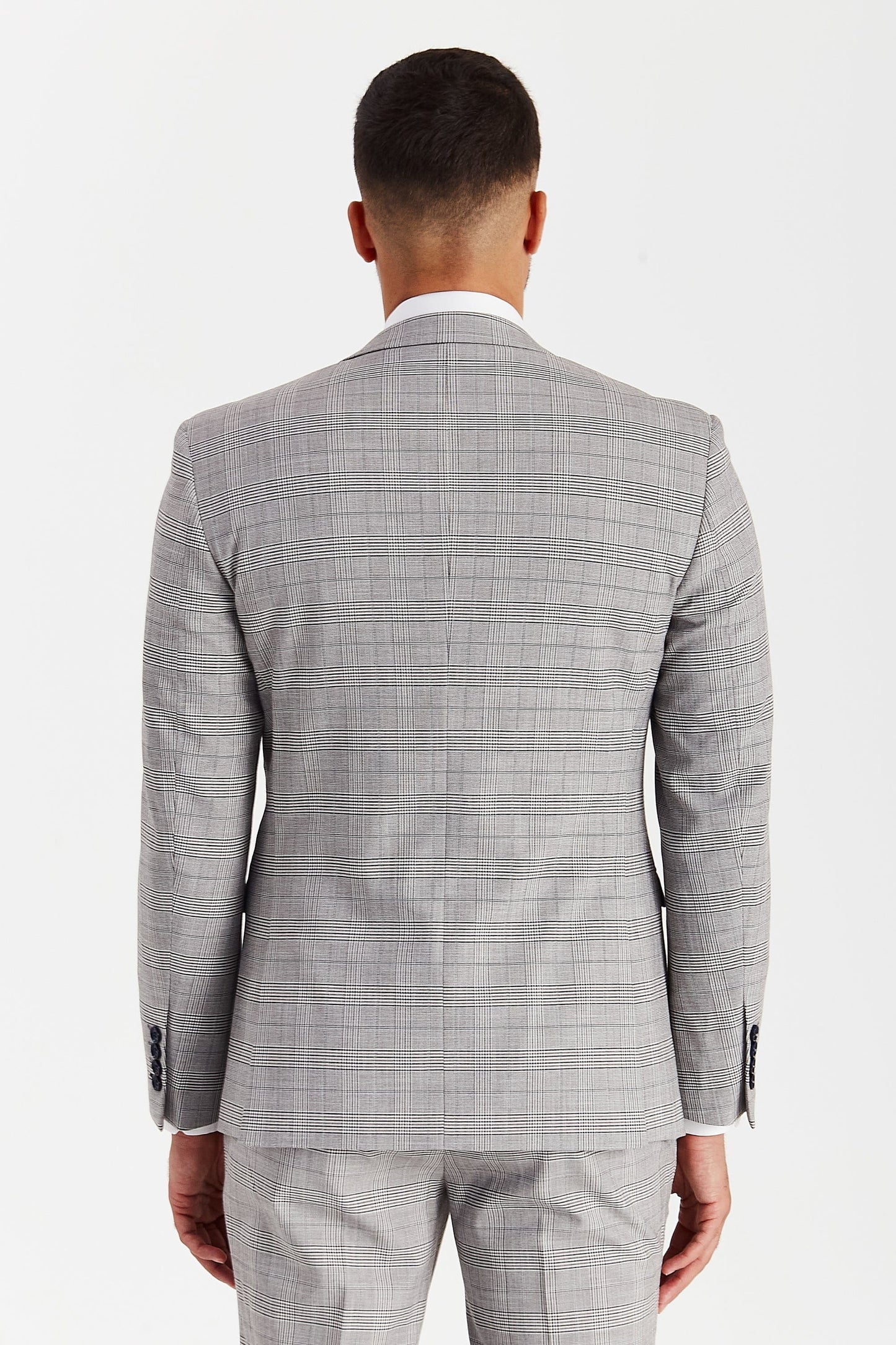 Rear view of the Paul Andrew Hugo Grey Checked Suit showing the tailored silhouette