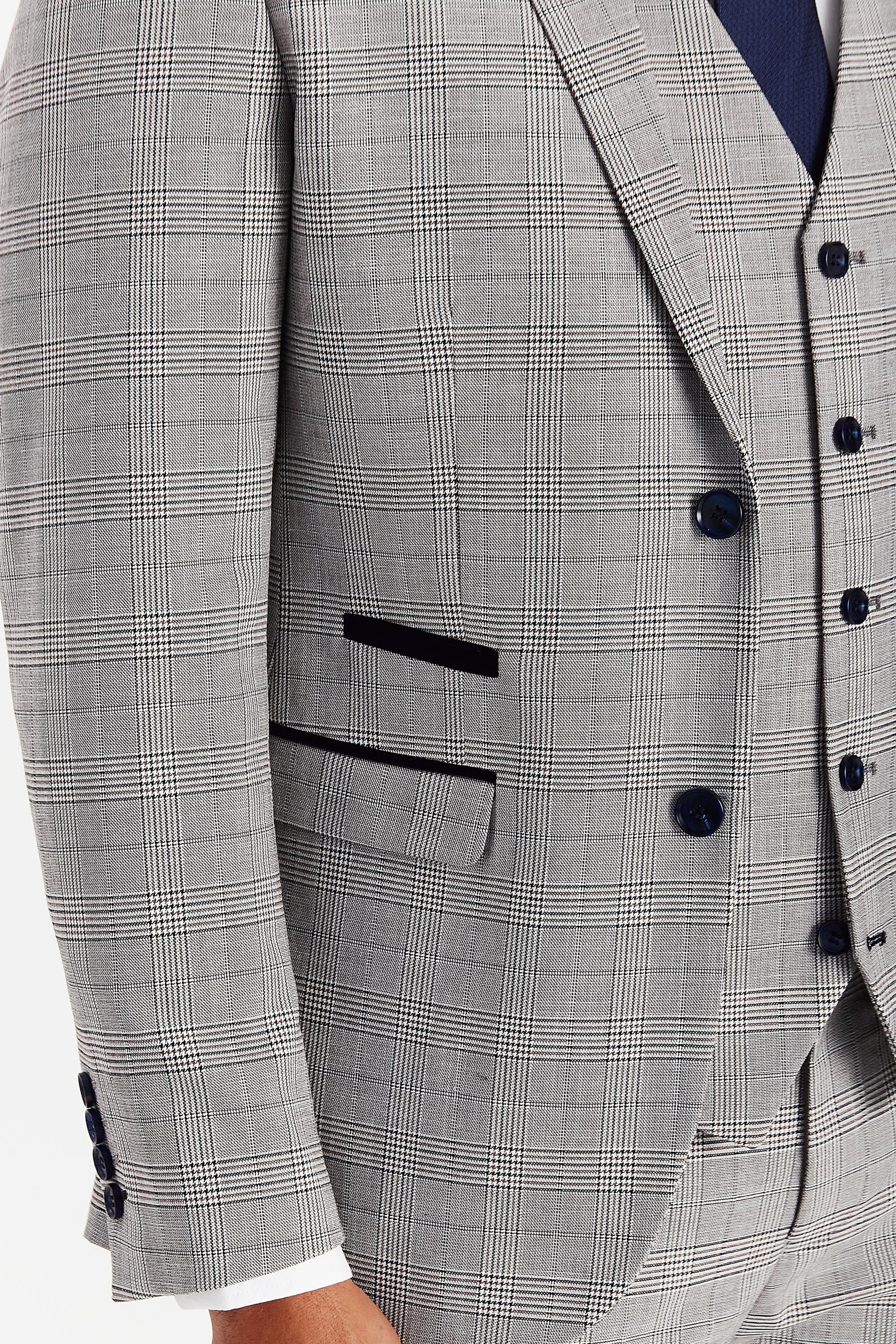 Close-up of Hugo Grey Checked Suit jacket showing navy trimmings and fabric texture