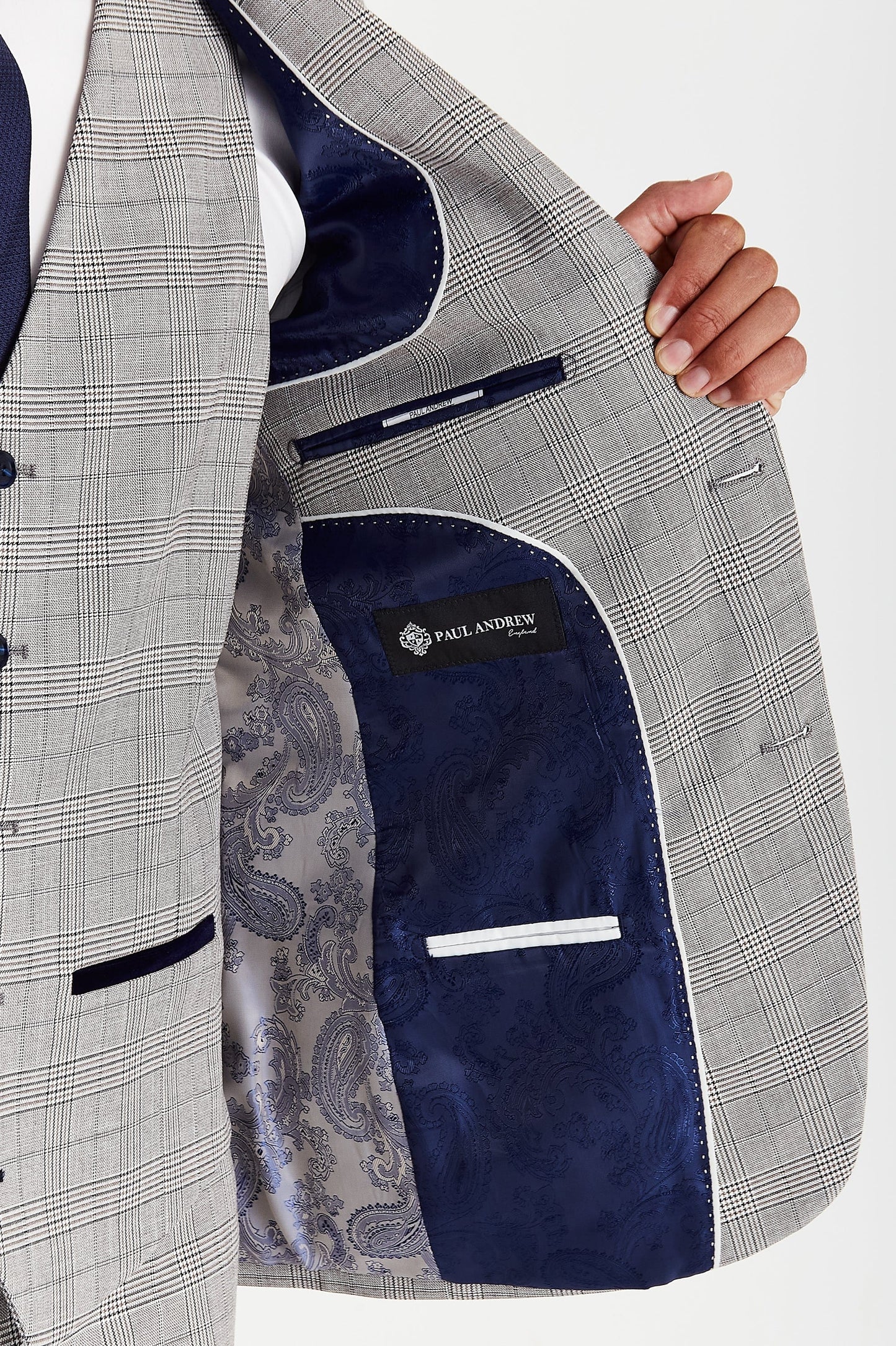 Inside lining of the Paul Andrew Hugo Grey Suit showing silver and navy paisley detail