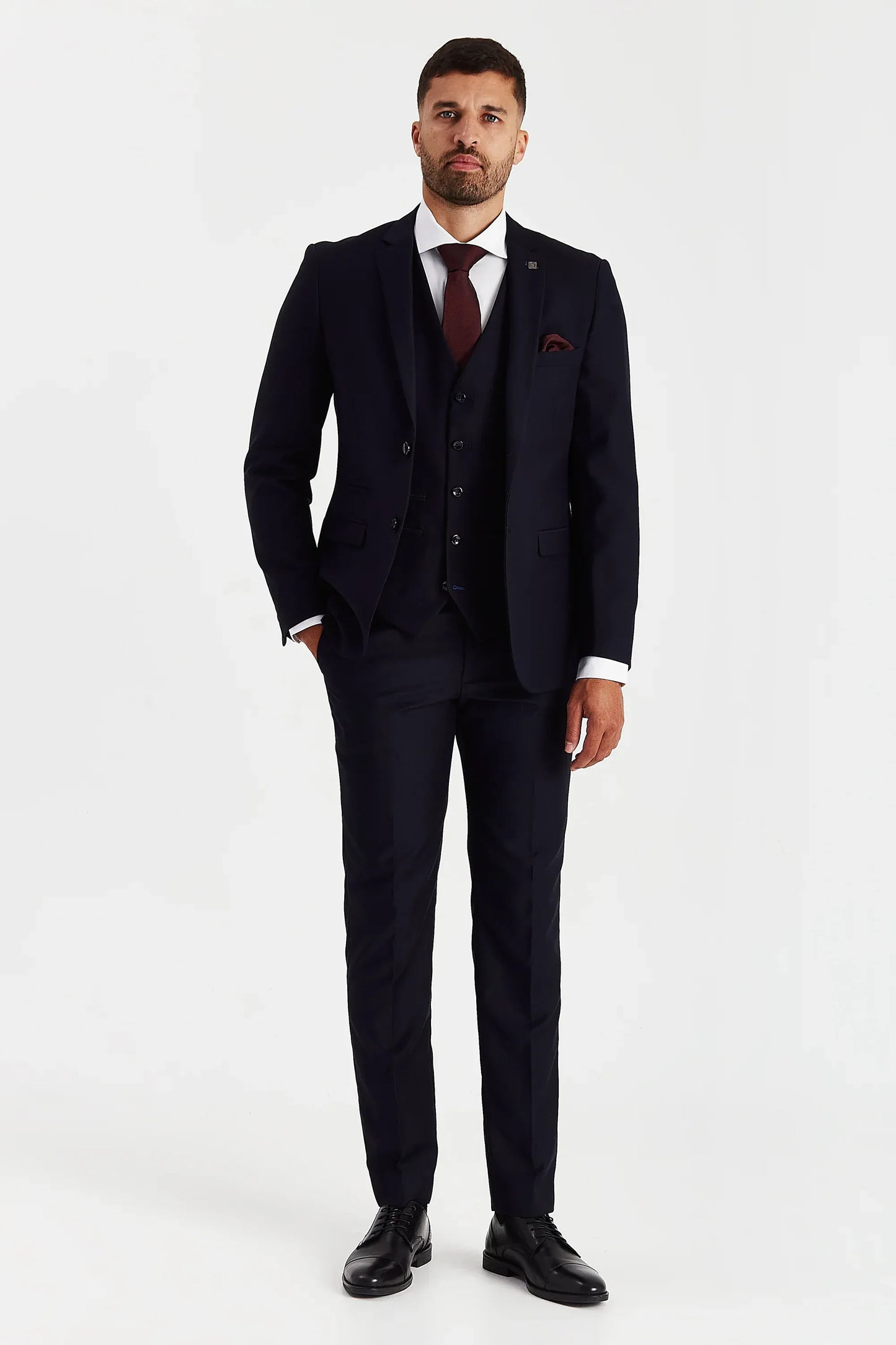 Male model wearing the Paul Andrew Parker Navy Three Piece men’s suit from Menz Suits Stockport, featuring deep navy fabric and tailored fit design.