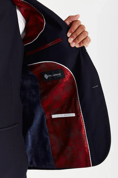 Inside view of the Paul Andrew Parker Navy Three Piece men’s suit jacket from Menz Suits Stockport, featuring double panel paisley lining in navy and red with detailed stitching.