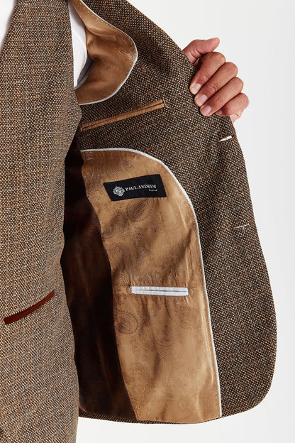 Inside view of the Paul Andrew Ralph Brown Tweed Three Piece men’s suit from Menz Suits Stockport, featuring brown and gold paisley lining and detailed stitching.
