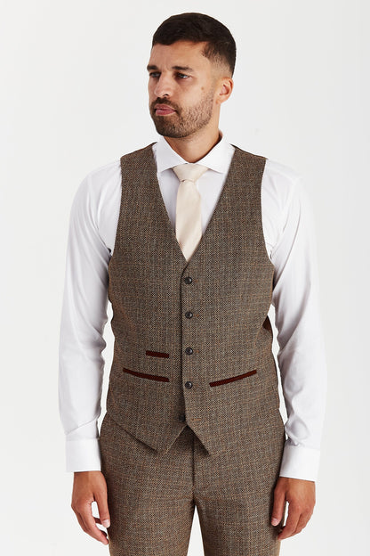 Front view of the Paul Andrew Ralph Brown Tweed men’s waistcoat from Menz Suits Stockport, showing matching tweed fabric, brown buttons, and suede trim detail.