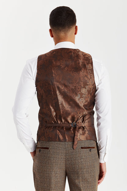 Rear view of the Paul Andrew Ralph Brown Tweed men’s waistcoat from Menz Suits Stockport, featuring adjustable back strap and brown paisley finish.