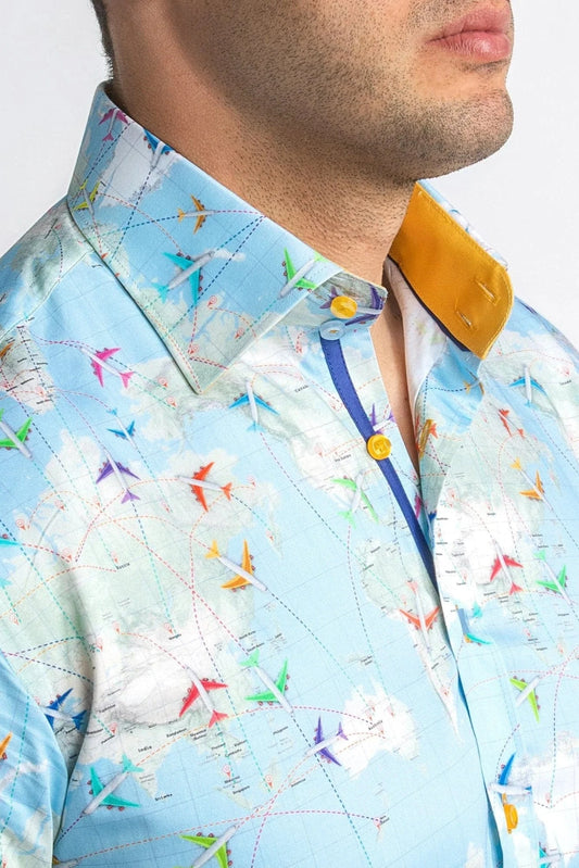 Close-up of a colorful shirt with airplane pattern on a white background