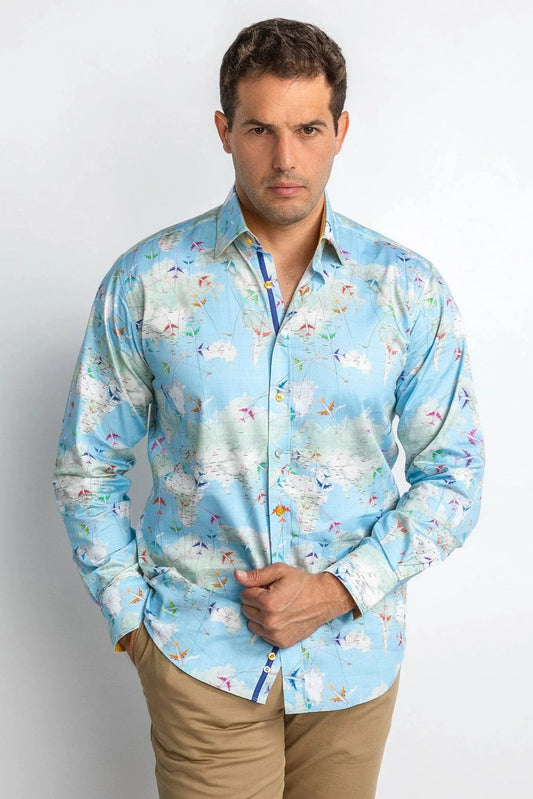 Man wearing a light blue patterned shirt against a white background
